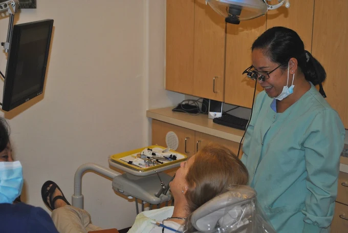 Dr. Cruz-Agustin treating a patient in the office